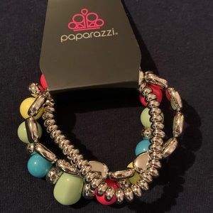 Never worn, multi-colored & silver bracelet set